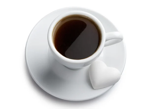 Tasse Kaffee mit herzförmigem Keks — Stockfoto