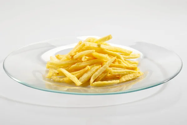 stock image Fried potatoes on the plate over white background