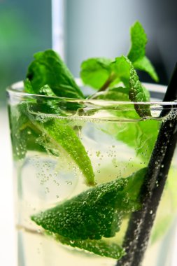Mojito cocktail closeup with air bubbles clipart