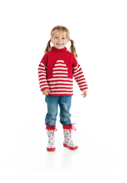 Mała dziewczynka jesień odzież skok — Zdjęcie stockowe