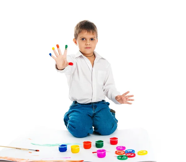 Liten pojke omfattas i paint — Stockfoto