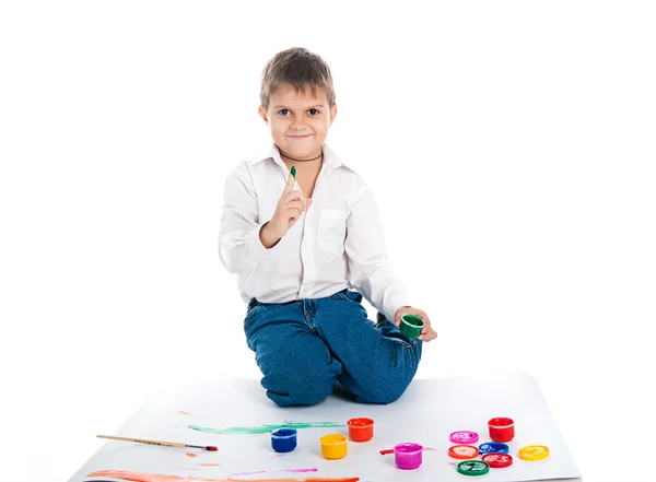 Cute little boy with bright paint — Stock Photo, Image