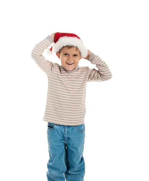 Liten pojke i en jultomten hatt — Stockfoto