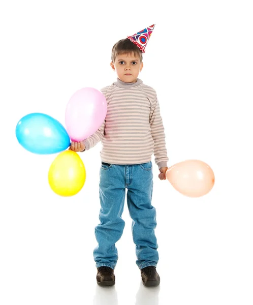 Smutný kluk v čepici narozeniny — Stock fotografie