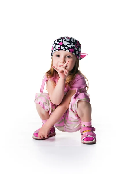 Kleines Mädchen mit Kopftuch auf weißem Hintergrund — Stockfoto