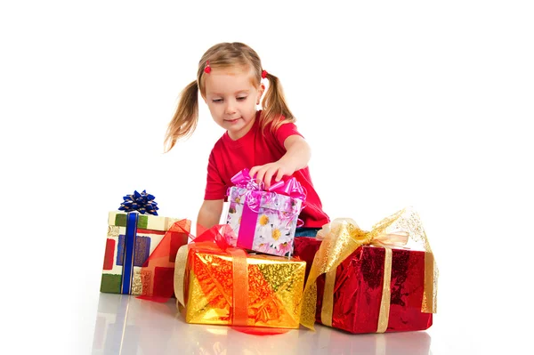 Menina wih as caixas de presentes — Fotografia de Stock