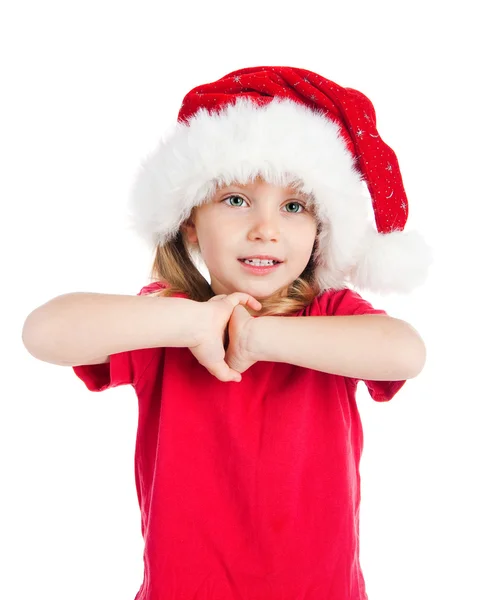 Noel Baba şapkalı küçük kız. — Stok fotoğraf