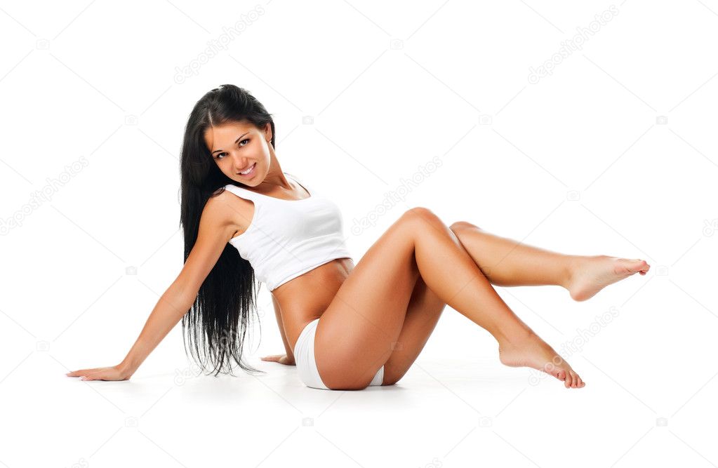 Young women sit on white background