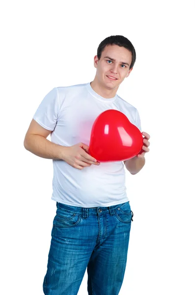 Sevimli genç menl bir kırmızı kalp — Stok fotoğraf