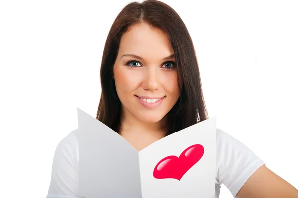 Menina bonito com cartão de um Valentim — Fotografia de Stock