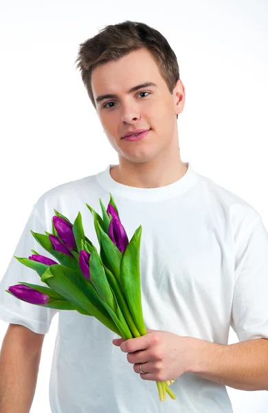 Bonitos Jovens Dão Flores Sobre Backgroung Branco — Fotografia de Stock