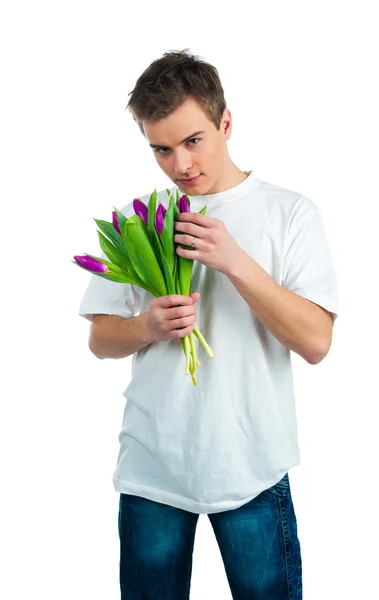 Roztomilý mladí muži dávají květiny — Stock fotografie