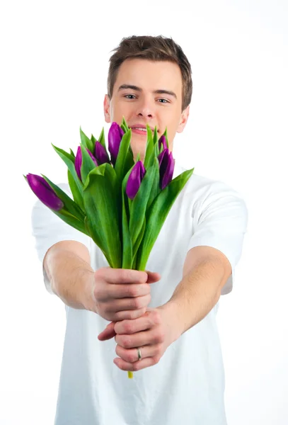 Χαριτωμένο Νέων Ανδρών Δώσει Λουλούδια Πάνω Από Λευκό Backgroung — Φωτογραφία Αρχείου