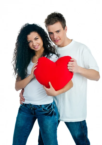 年轻夫妇与白色背景上的一颗心 — 图库照片