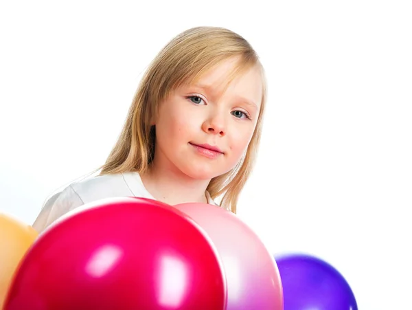 Гарненька дівчинка з повітряними кулями — стокове фото