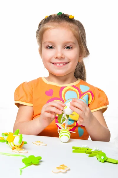 Happy little girl with easter eggs. — Stock Photo, Image