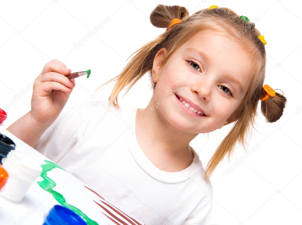 Little girl with paint