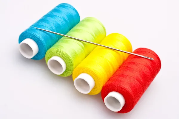 Colored thread for sewing with needle — Stock Photo, Image