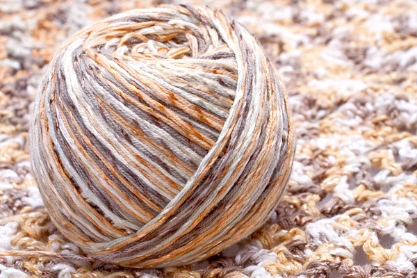 Striped beige tangle of yarn — Stock Photo, Image