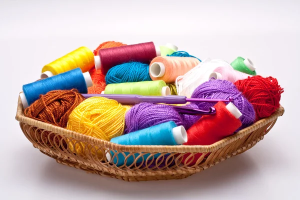 Basket with thread and balls for knitting — Stock Photo, Image