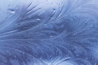 Natural ice pattern on winter glass clipart