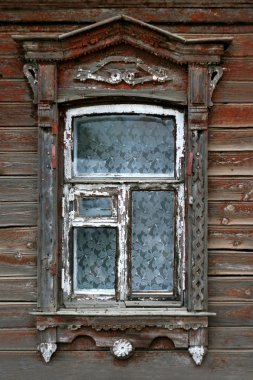 Window of very old wooden russian house clipart
