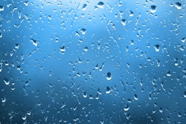 Water drops on glass close up clipart