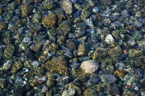 Камни под морем Стоковое Изображение