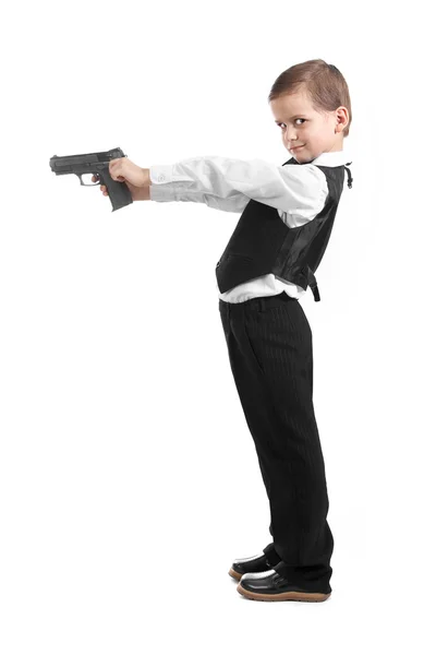 Мальчик с оружием — стоковое фото