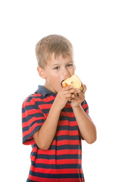 Chłopiec trzyma jabłko — Zdjęcie stockowe