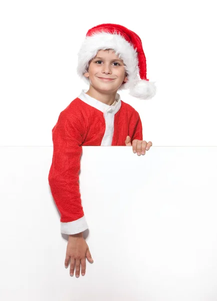 Мальчик с рождественским плакатом — стоковое фото