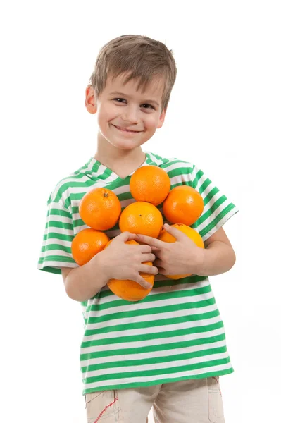 stock image Boy holding oranges