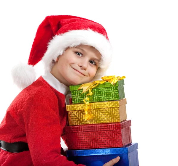 Мальчик держит рождественский подарок — стоковое фото