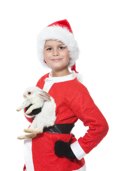 Junge hält Weihnachtskaninchen in der Hand — Stockfoto