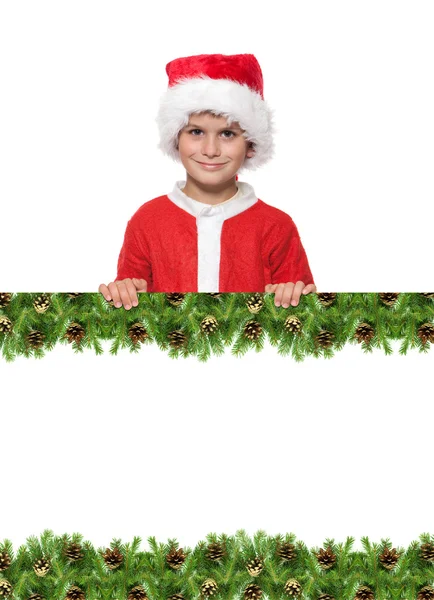 Pojken håller en jul-affisch — Stockfoto