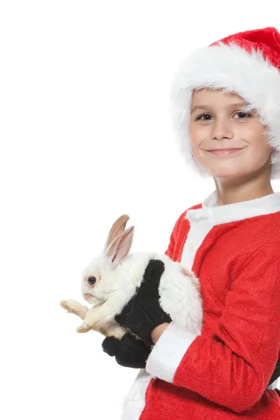 Chłopiec trzyma pewien królik Boże Narodzenie — Zdjęcie stockowe
