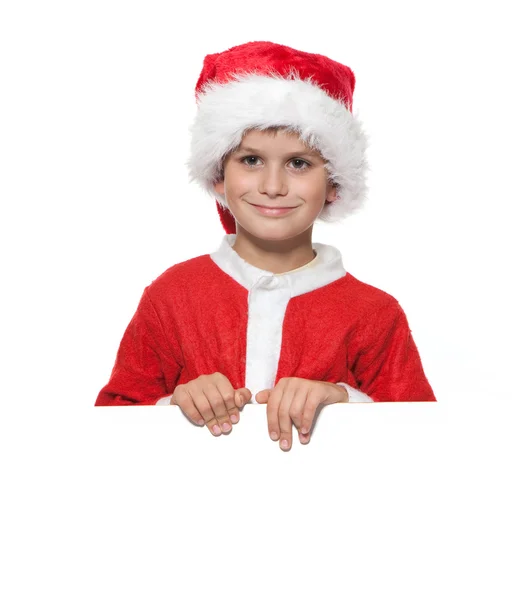 Pojken håller en julklapp — Stockfoto