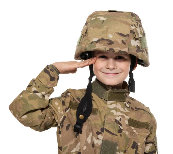 Voják zdravit. mladý chlapec — Stock fotografie