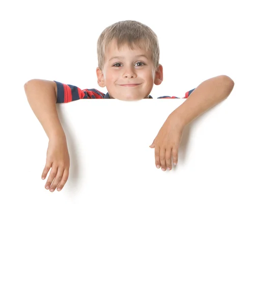 Beyaz Arka Plan Üzerinde Izole Bir Afiş Tutan Çocuk — Stok fotoğraf