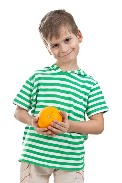 Menino segurando laranjas — Fotografia de Stock