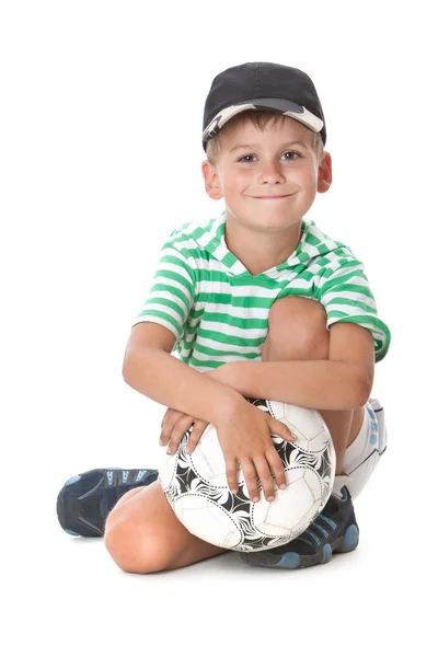 Junge hält Fußball in der Hand — Stockfoto