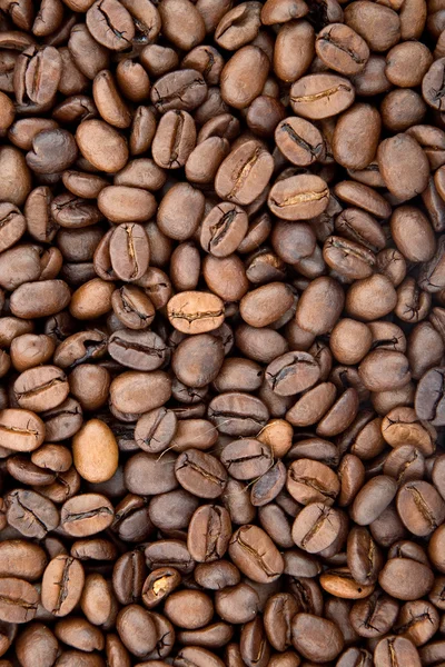 芳香族の焙煎コーヒー豆茶色の背景 — ストック写真