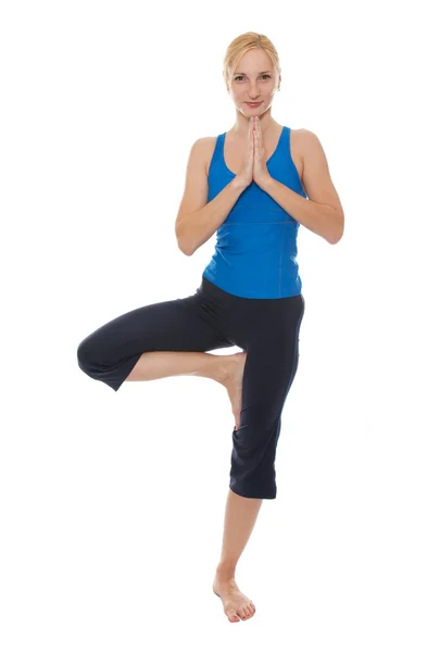 Yoga Uygulamak Genç Bir Kadın Beyaz Zemin Üzerine Izole — Stok fotoğraf