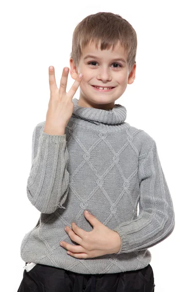 Lindo Chico Oliendo Mostrando Tres Dedos Aislados Sobre Fondo Blanco —  Fotos de Stock
