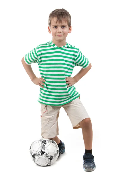 Menino segurando bola de futebol — Fotografia de Stock