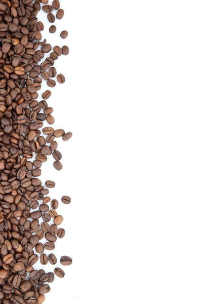 Brown roasted coffee beans isolated on white background
