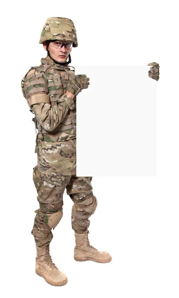 Modern soldier holding a poster — Stock Photo, Image