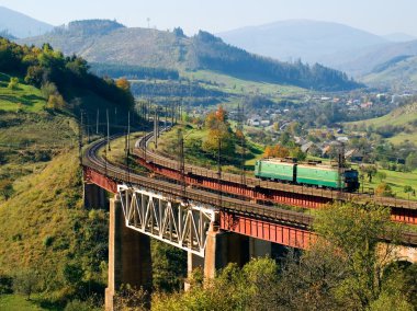 Train on bridge. clipart