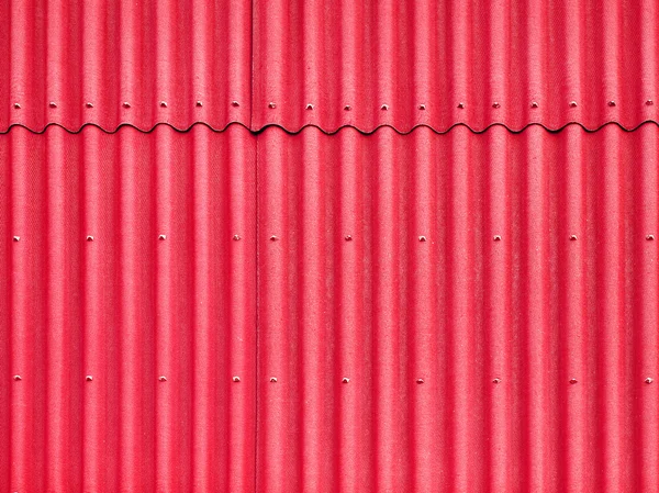 Röda tak närbild bakgrund. — Stockfoto