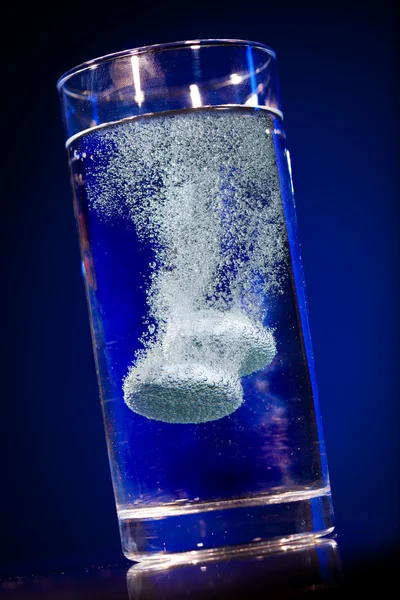 Tablet in a water glass — Stock Photo, Image